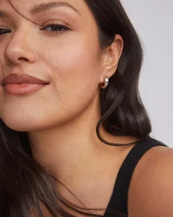 Mikki Metal Huggie Earrings in Silver
